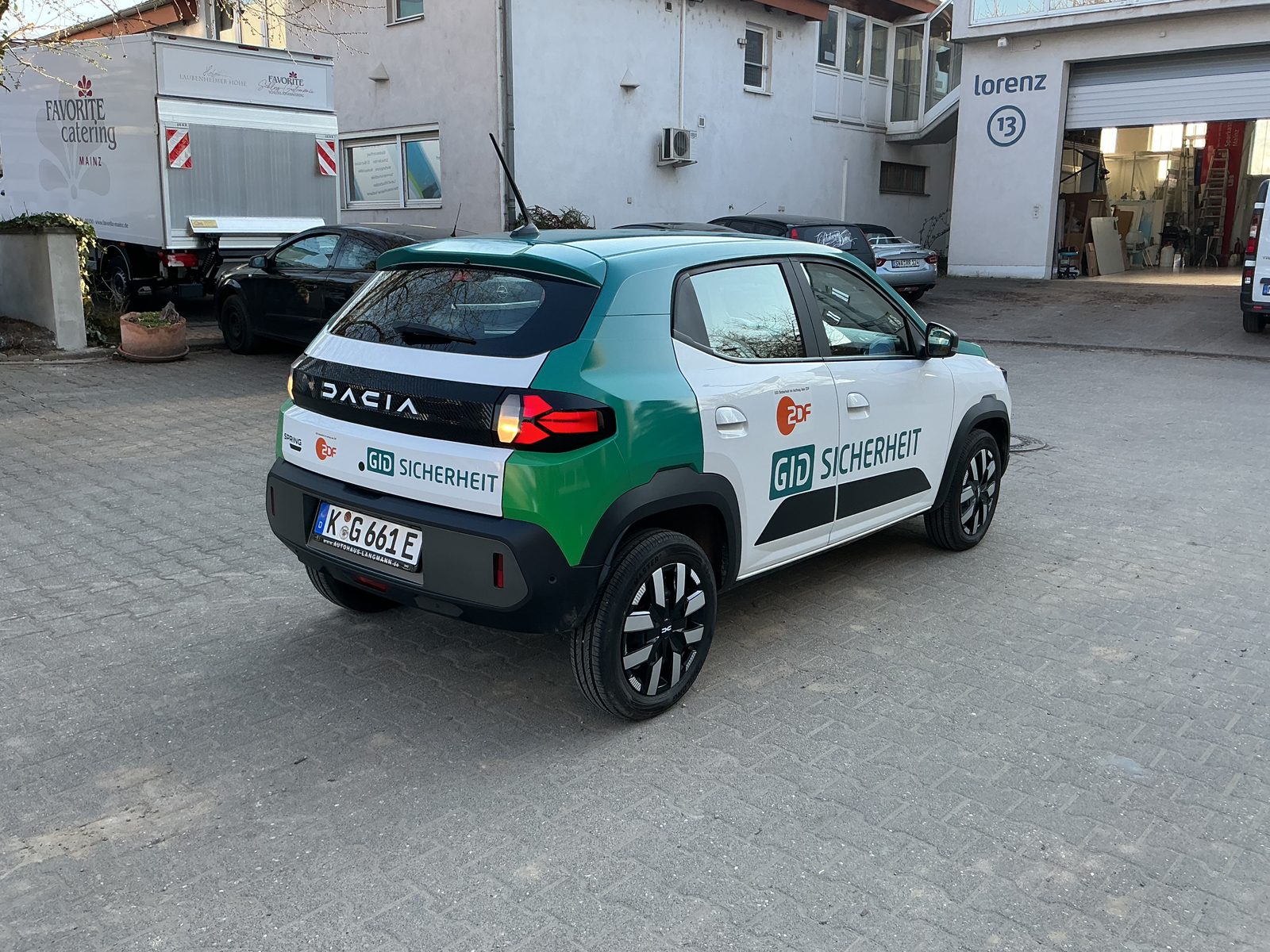 GID Sicherheit Dacia Spring – Heck links, Lorenz Werbung Mainz